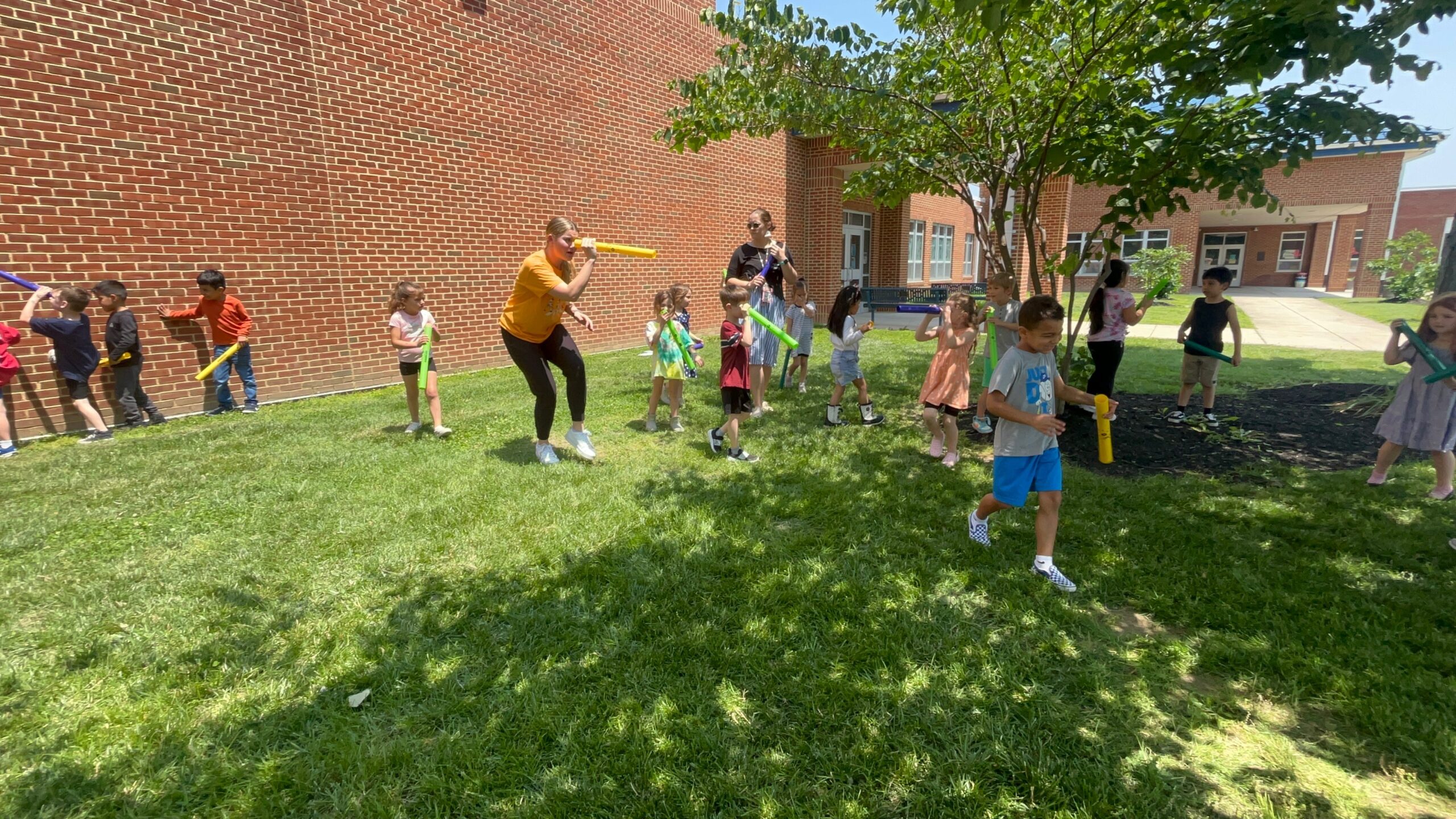Gabby leads the students outside in a fun movement activity at Kent Island Elementary School.