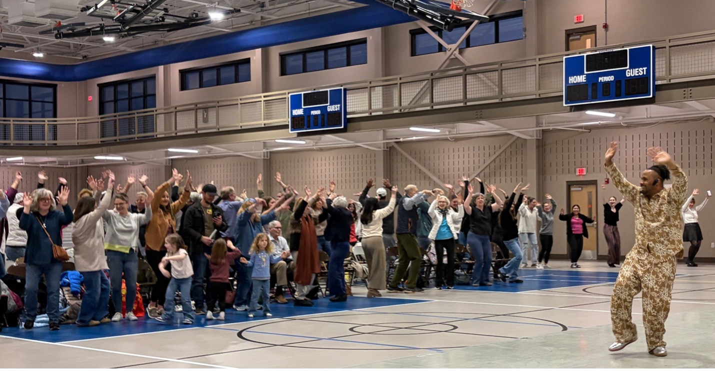 Rodney Hampton Director of BH2 leads the audience in a salsa dance lesson!