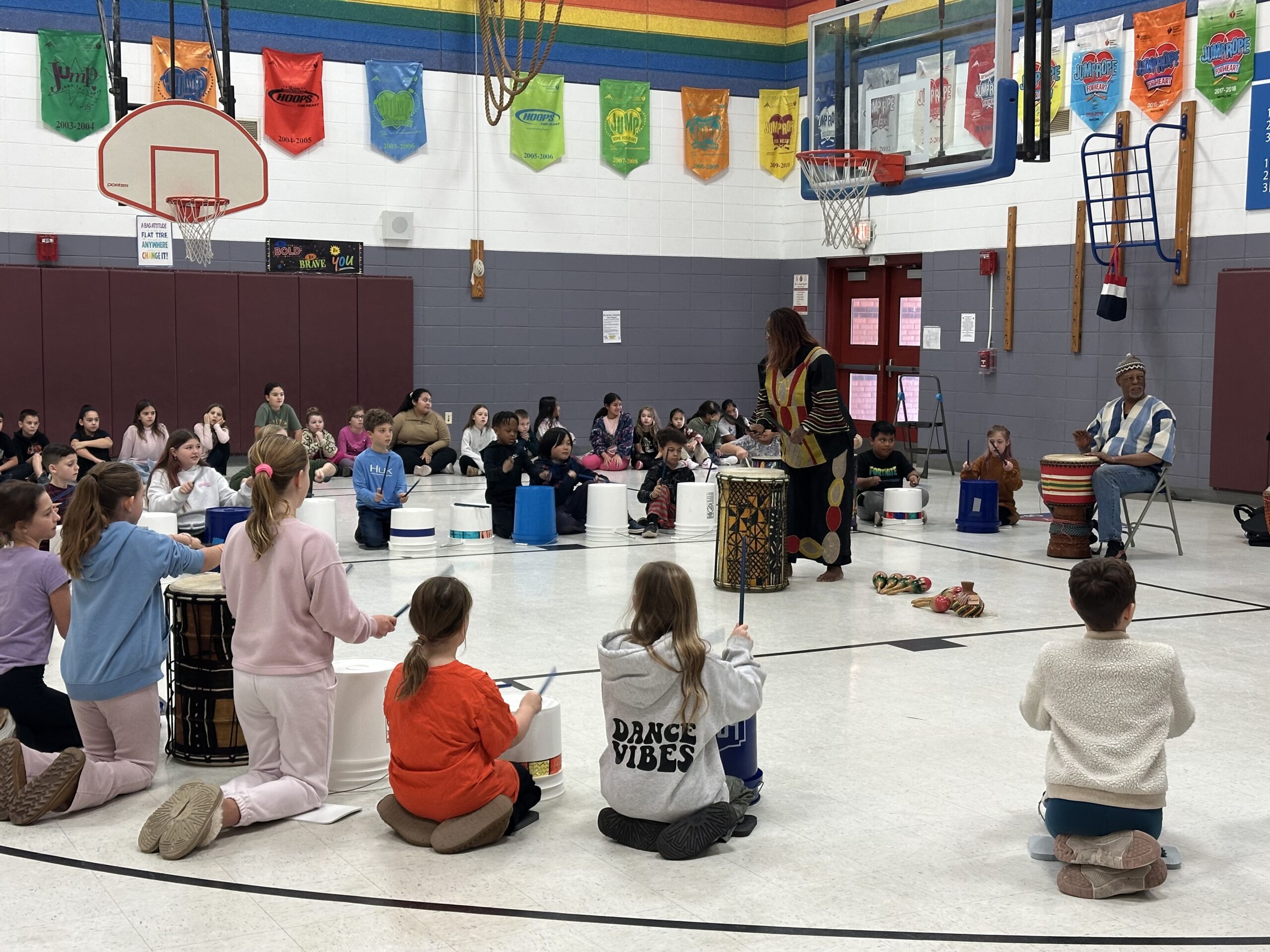 CCF Guest Teaching Artist Sylvia Soumah drumming with classes at Grasonville Elementary School.