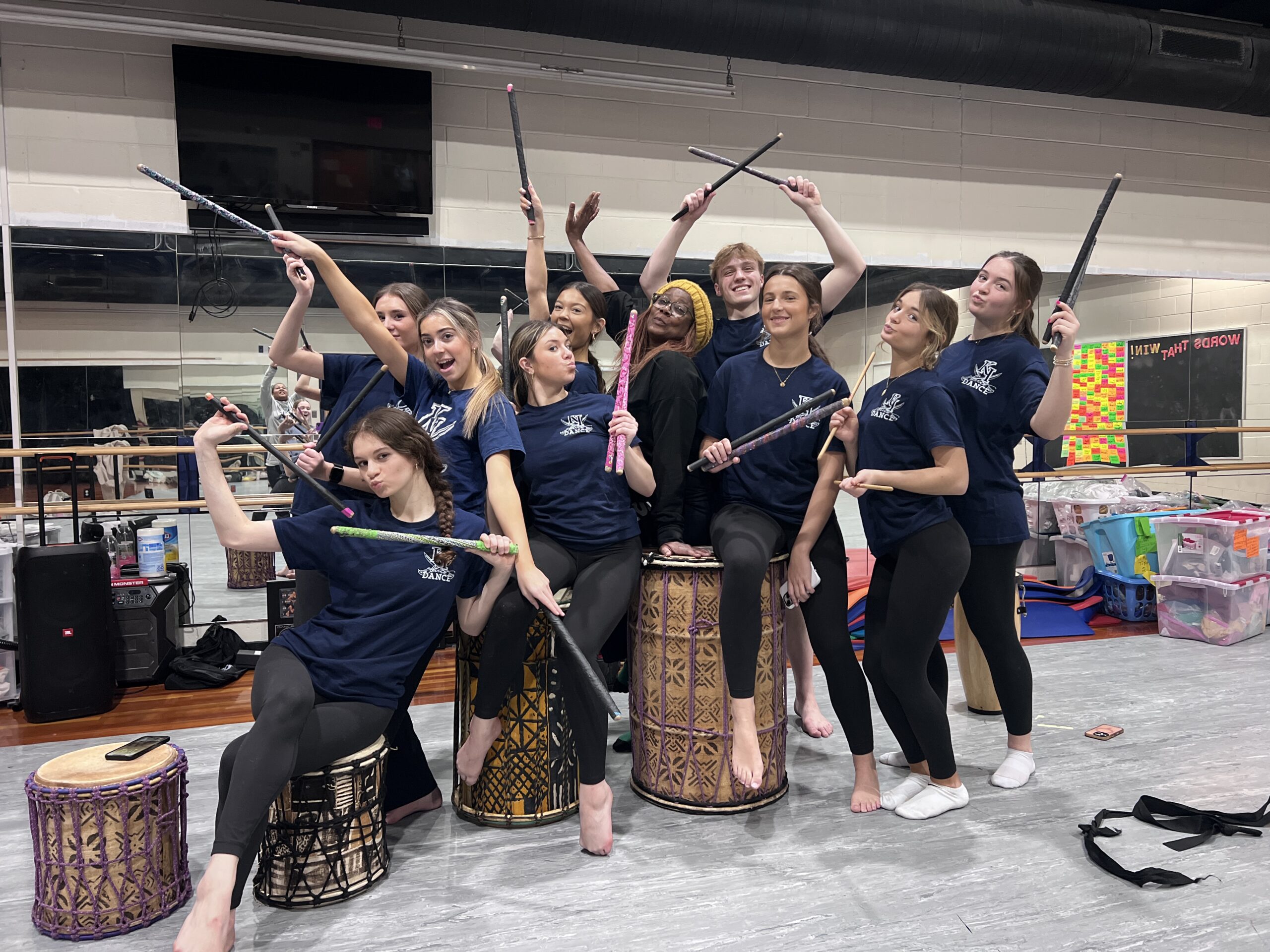 Sylvia (center) with the KIHS Dance Company dancers in rehearsal.