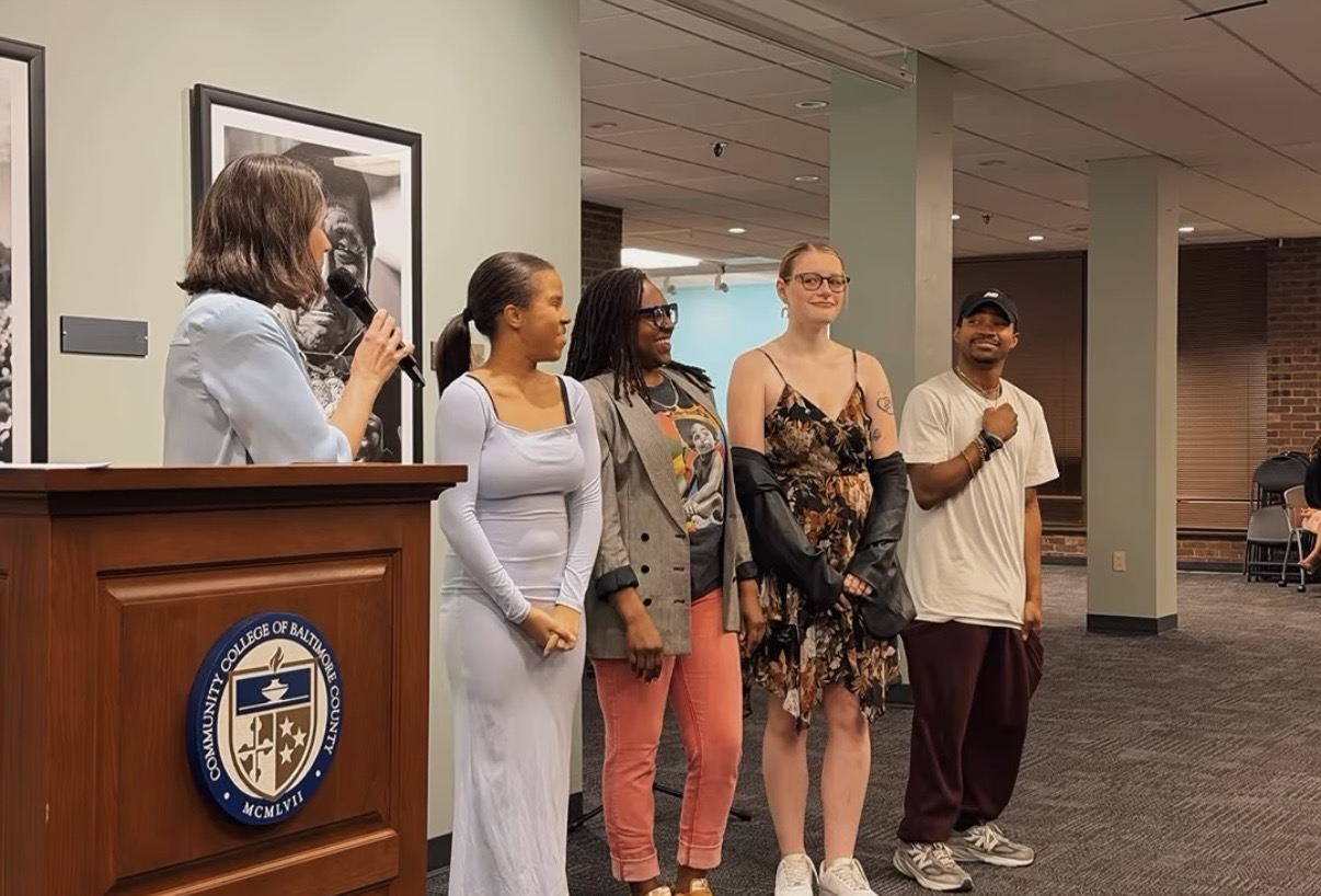 (L to R) Melinda Blomquist with scholarship recipients Kenea Dorsey, Charnel Marshall, Sarah Harris and Andre Payne members of the CCBC Dance Company.