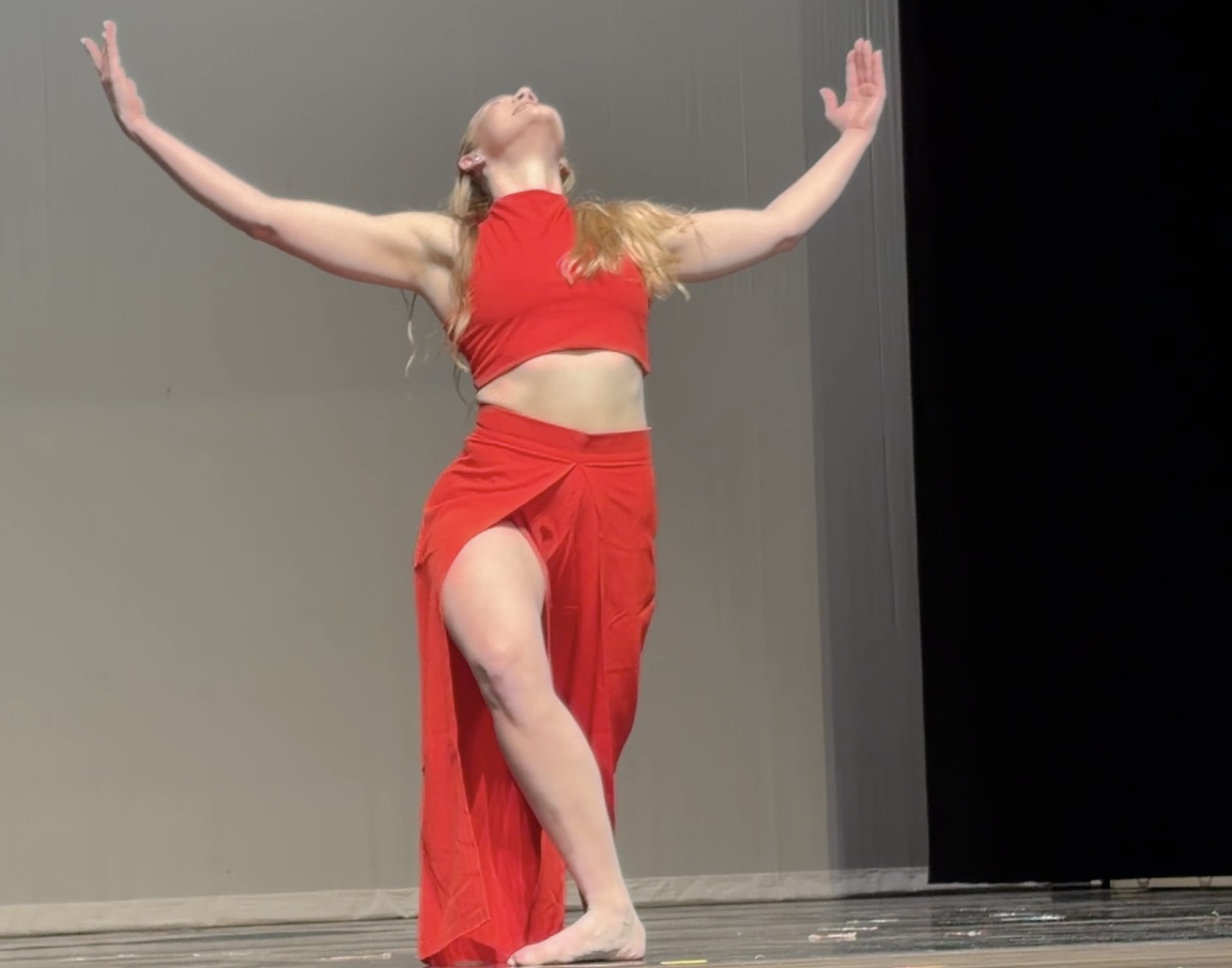 CCF Teaching Artist, Gabby Pfeiffer on stage in Peter Pucci’s solo Sing.